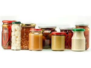 Wrap-around labeling for glass food jars