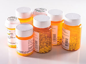 Wrap-around labeling for pharmaceutical bottles