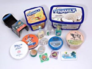 Top labeling for dairy product packaging like yogurt cups.